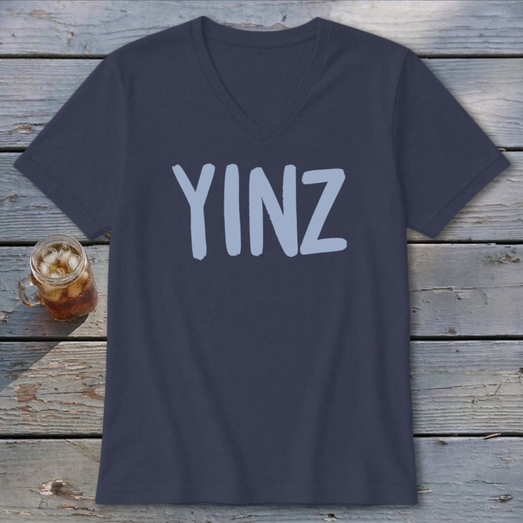 Dark blue v-neck t-shirt with light blue "YINZ" graphic.