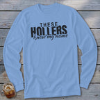 Light blue long-sleeve shirt with black text "THESE HOLLERS know my name".