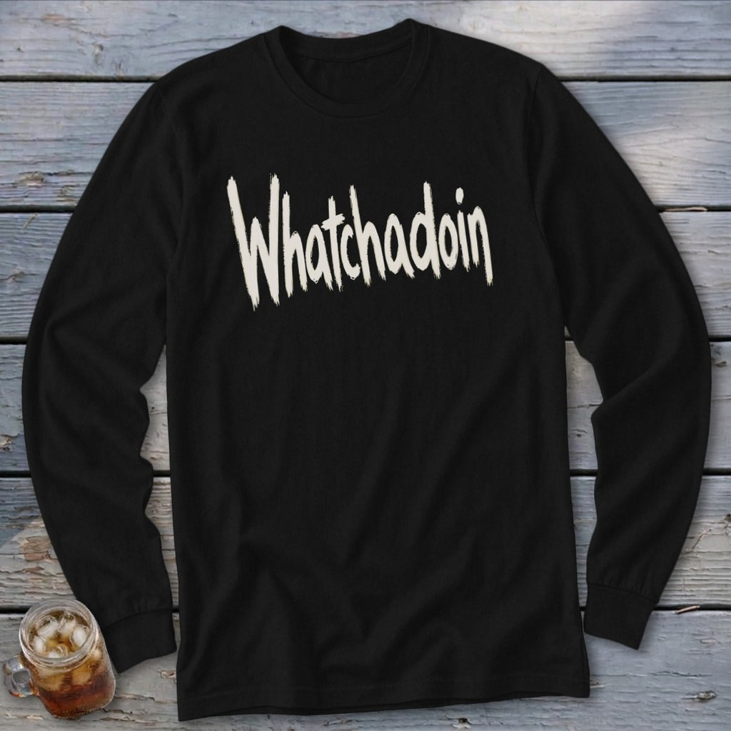 Black long-sleeve shirt with "Whatchadoin" printed in cream script.