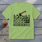 Light green t-shirt with black graphic of stacked firewood, axe, and text.