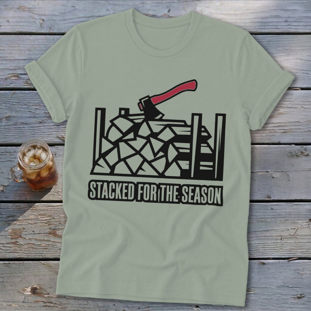 Light green t-shirt with stacked firewood and axe graphic, reading "STACKED FOR THE SEASON".