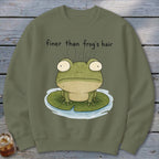 An olive green sweatshirt featuring an illustrated frog on a lily pad with the text finer than frog's hair.