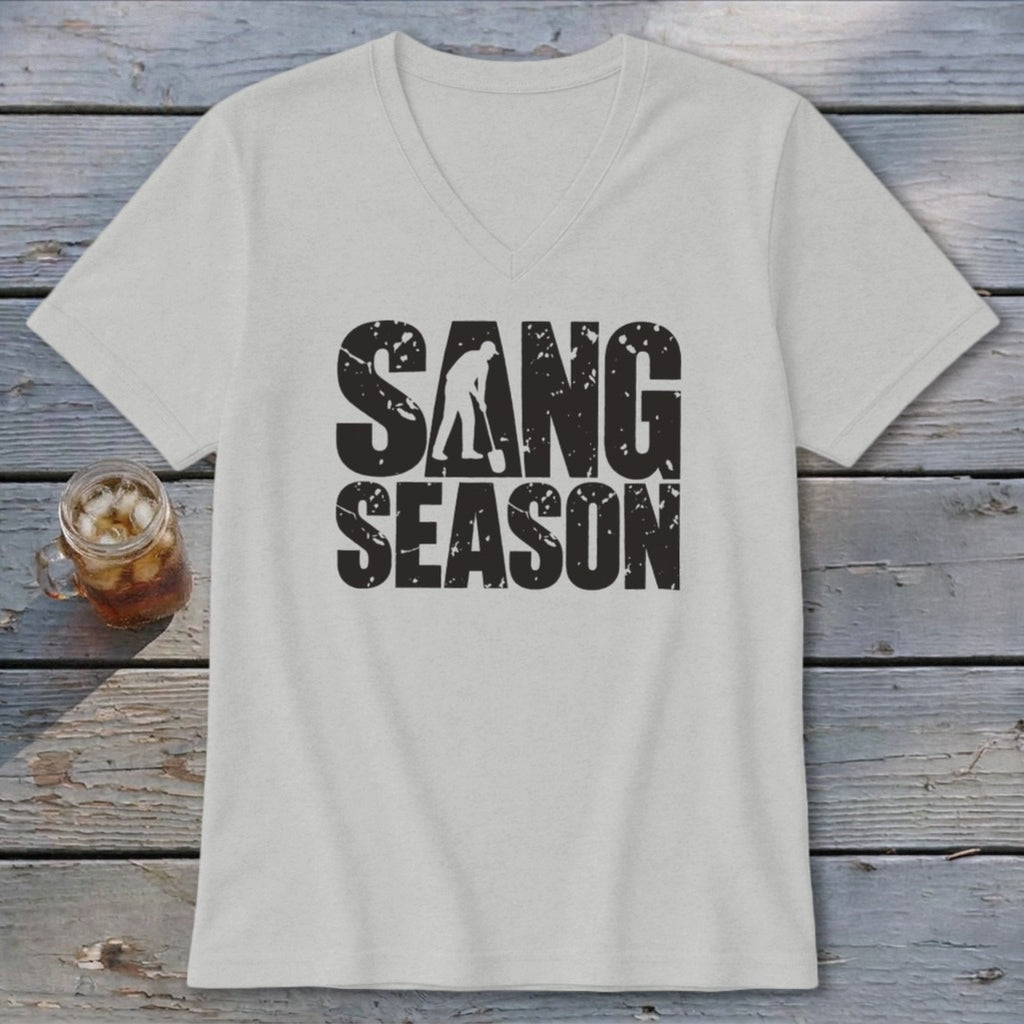 Light gray V-neck t-shirt featuring the distressed black text SANG SEASON on a wooden background.