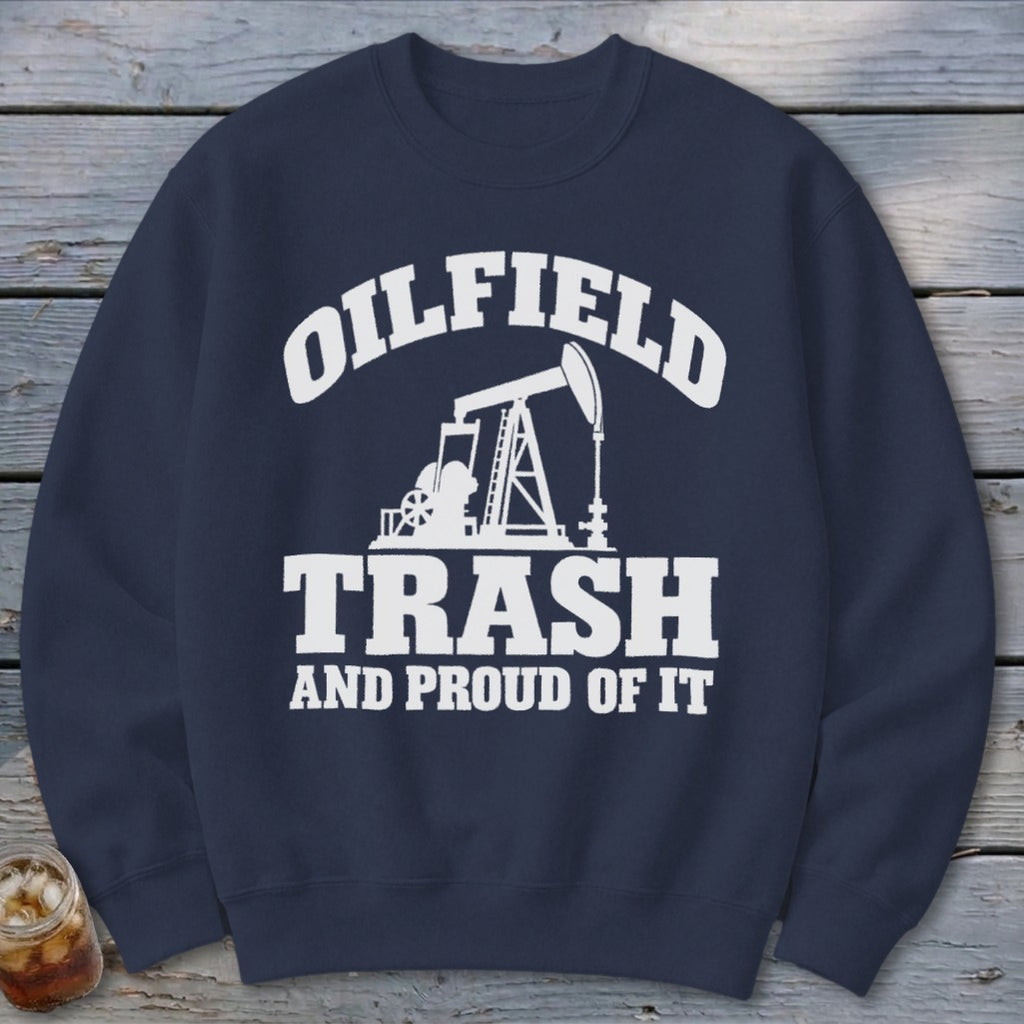 Navy sweatshirt with white text "OILFIELD TRASH AND PROUD OF IT" and oil pump graphic.