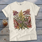 Cream t-shirt with a detailed floral print of wildflowers and fall leaves.