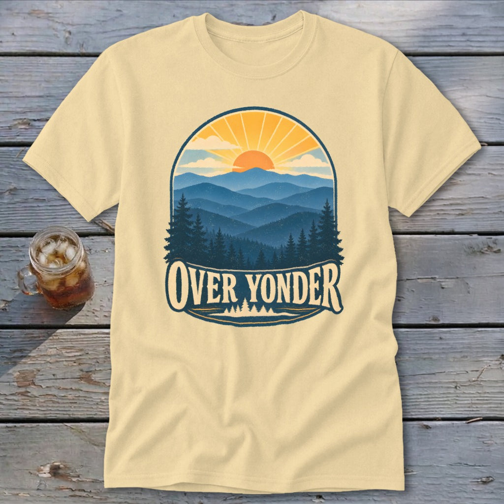 Cream t-shirt featuring a retro graphic of mountains, trees, a sun, and Over Yonder text.
