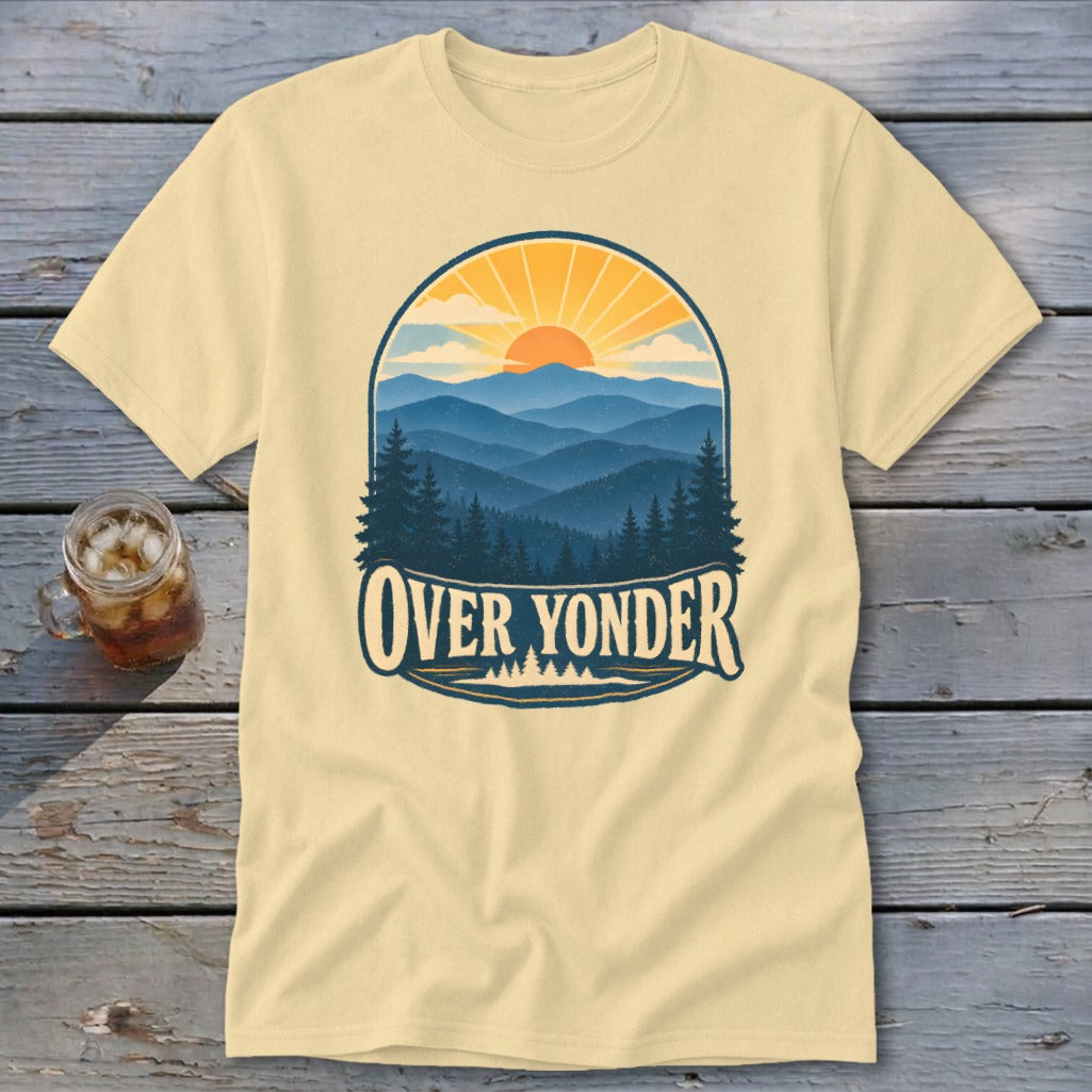 Cream t-shirt featuring a retro graphic of mountains, trees, a sun, and Over Yonder text.