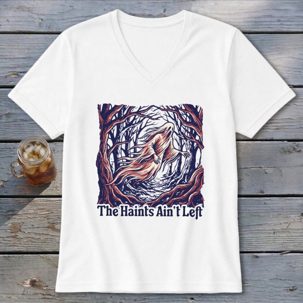 White t-shirt with a spooky ghost in a forest and text "The Haint's Ain't Left".