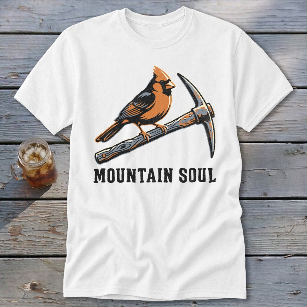 White t-shirt with a cardinal perched on a pickaxe and the text "MOUNTAIN SOUL".